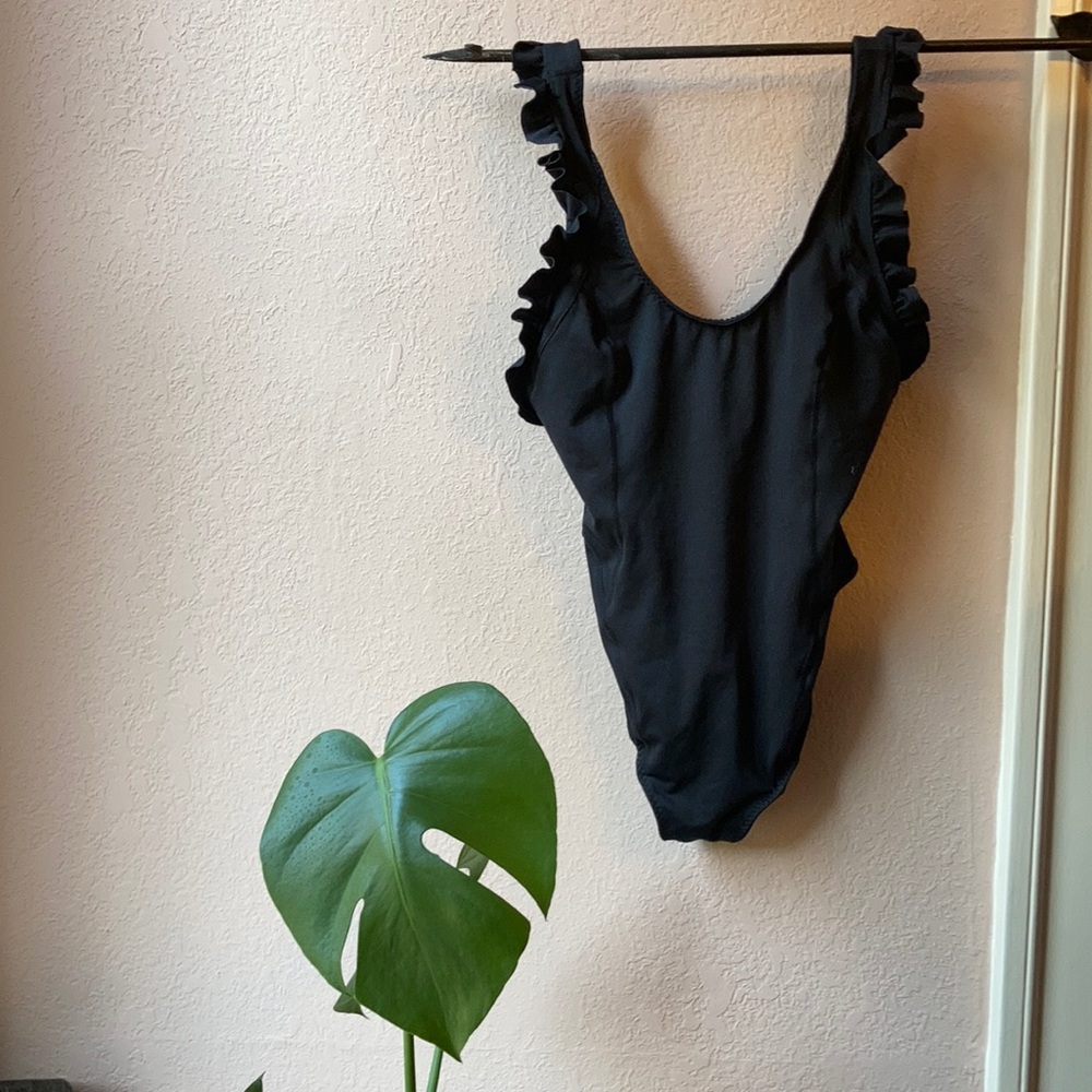 Free People One Piece black swimsuit with ruffle